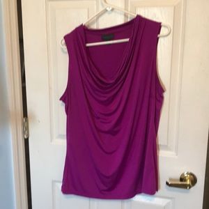 Pink drape neck shirt.